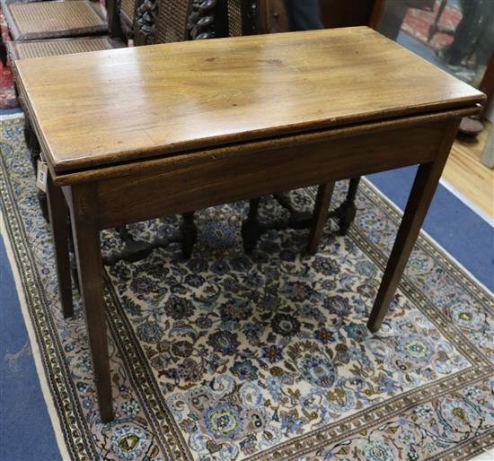 A George III mahogany tea table W.91cm